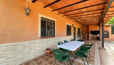 immaculate villa with a beatiful barbecue area