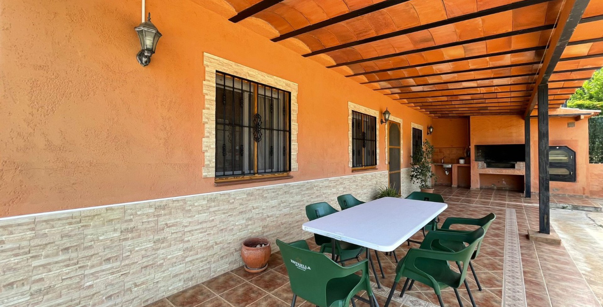 immaculate villa with a beatiful barbecue area